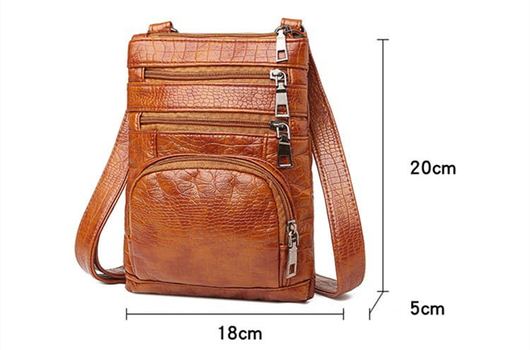 Brown retro crocodile textured soft leather crossbody bag with multiple zippers and a detachable strap.