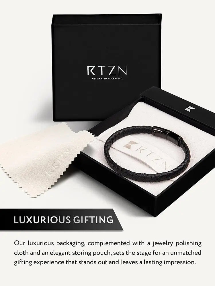 7mm black braided leather bracelet with stainless steel clasp displayed in elegant rtzn artisan handcrafted packaging