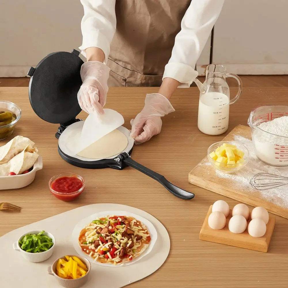 Black non-stick 8 inch pre seasoned cast iron tortilla press and roti maker with flat cooking surface and handle