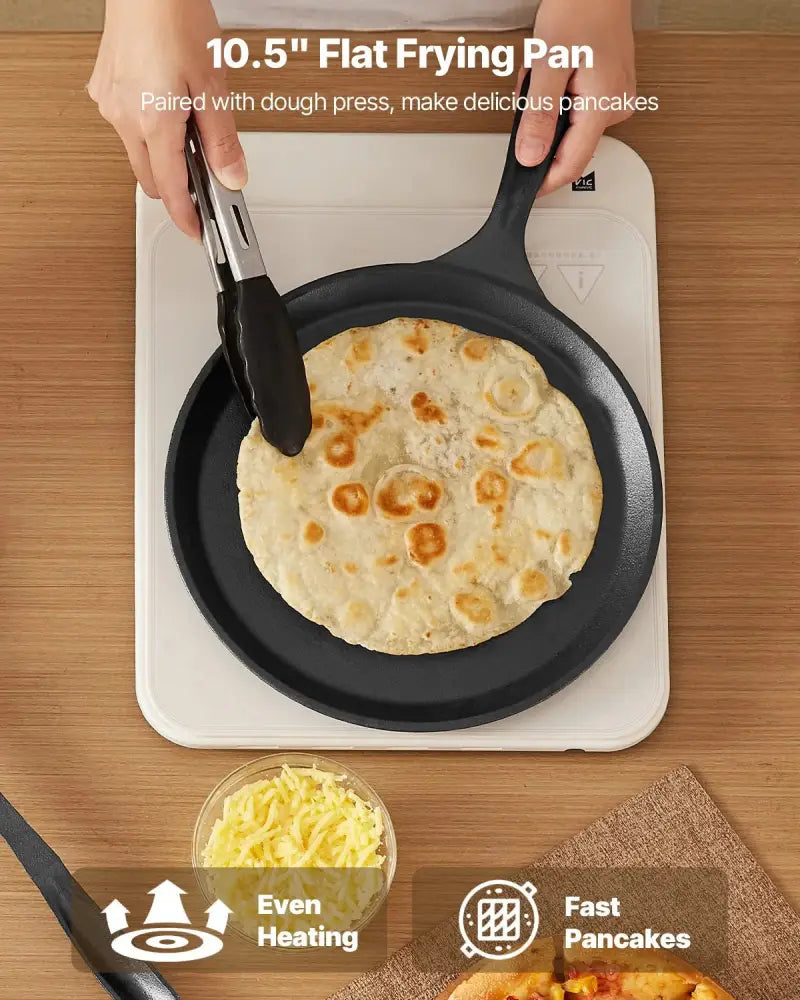 Black 10.5-inch flat cast iron frying pan with sturdy handle ideal for even and fast pancake cooking