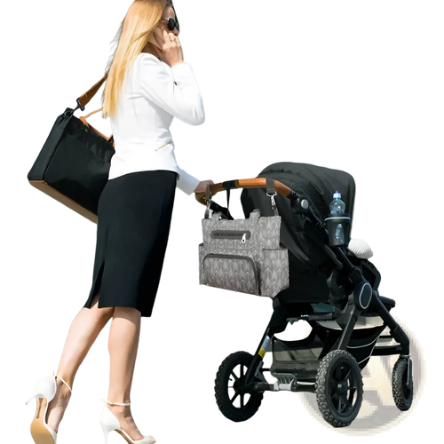 Gray patterned diaper bag with arrow print attached to stroller handle in 8 piece multifunctional diaper bag set