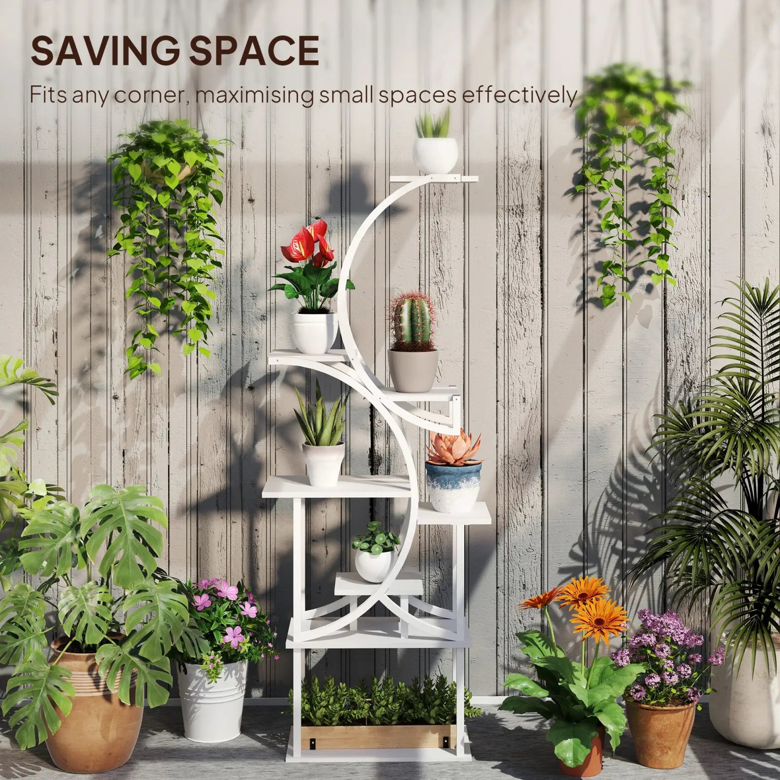 White metal 8 tier indoor plant stand with curved s shaped tiered shelves holding various potted plants
