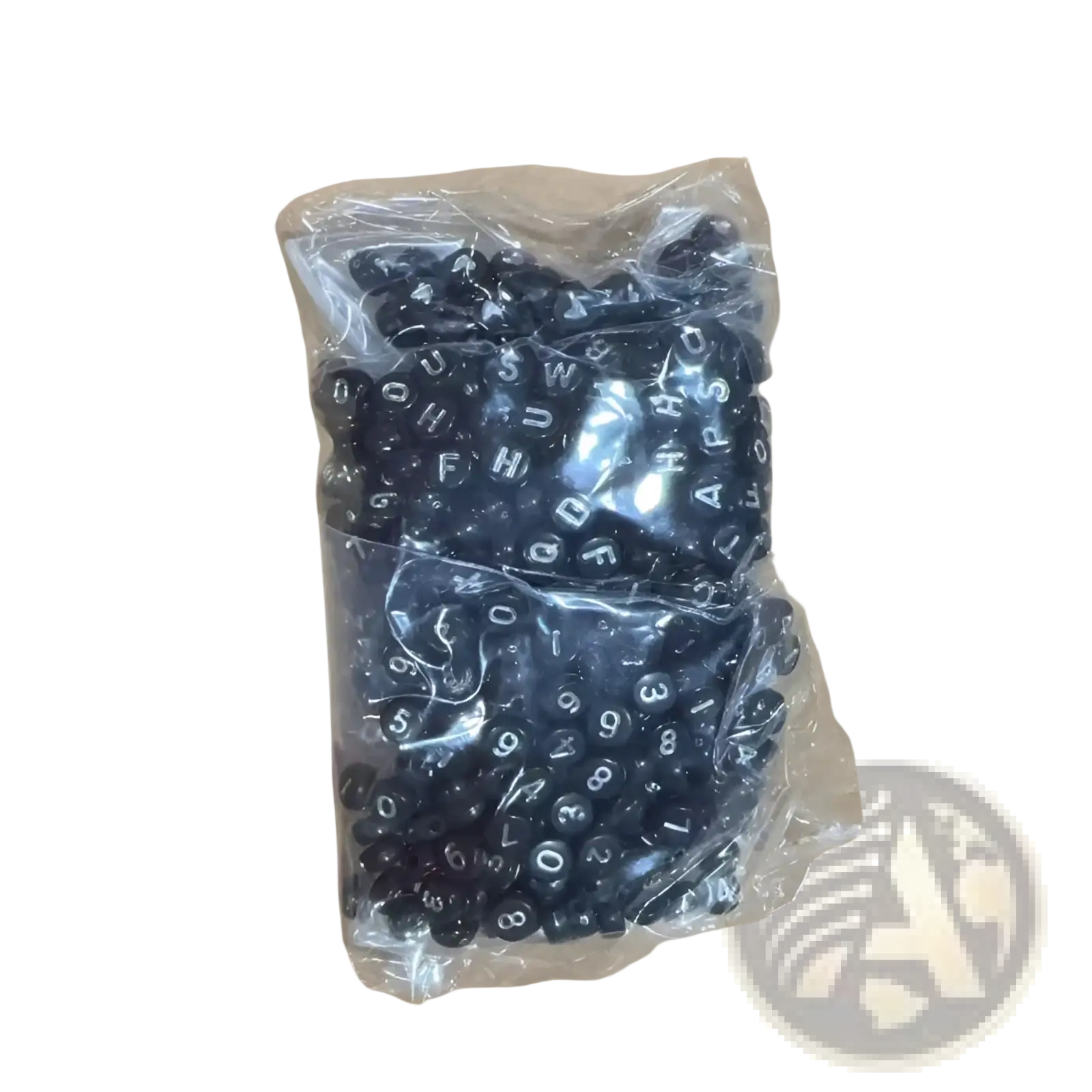 800 piece black acrylic alphabet and number bead set with white alphanumeric characters in a clear plastic bag