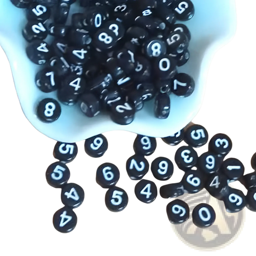 Black round glossy acrylic beads with white numerals from 800 piece black acrylic alphabet and number bead set