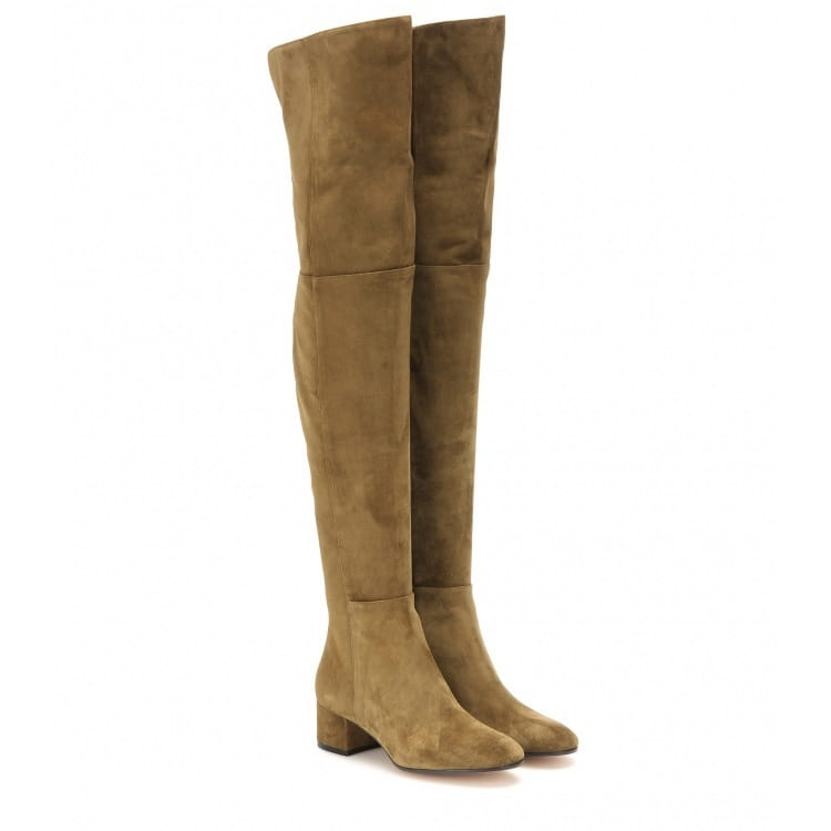 tan suede over the knee boots with a low block heel displayed from the back side