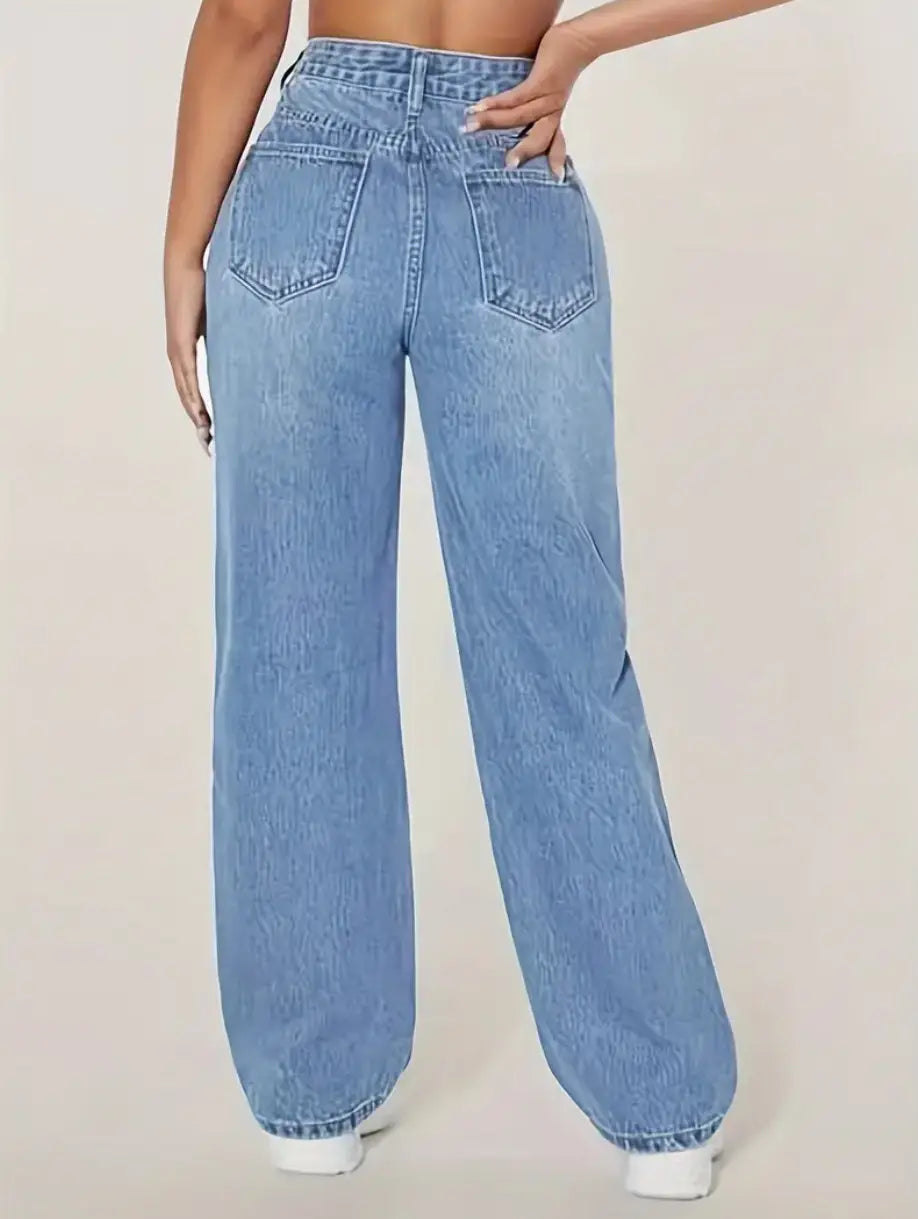 back side of distressed high rise wide leg denim jeans in light wash with classic back pockets and a slightly faded relaxed fit