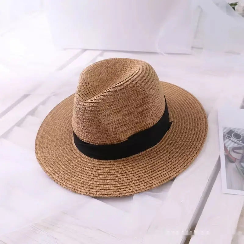 Beige woven straw fedora hat for men with uv proof feature and black ribbon band.