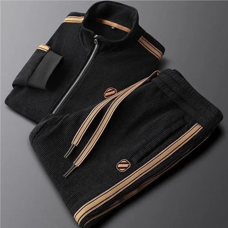 Men corduroy striped tracksuit set in black with tan stripes and matching logo patches made from soft corduroy fabric.