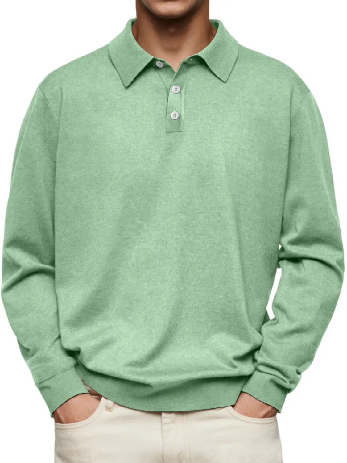 A soft mint green men long sleeve v neck button polo shirt with a classic collar and three white buttons.