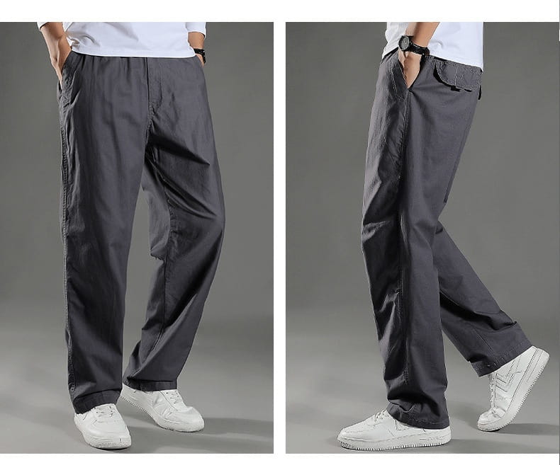 Dark gray relaxed-fit cotton cargo pants for men featuring multiple pockets and a casual Japanese style straight leg workwear design.