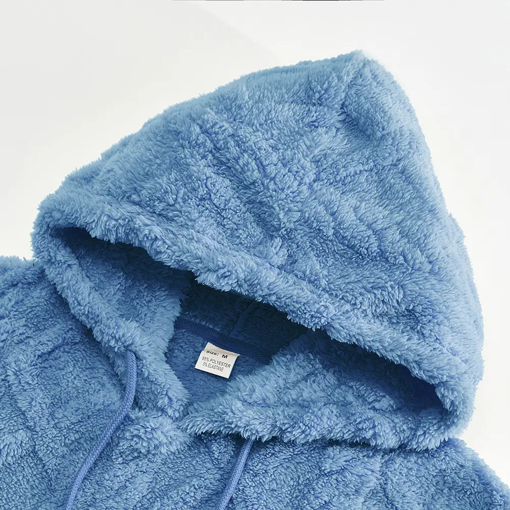 Men’s light blue fleece lined knit hoodie with a plush textured surface and matching drawstrings designed for comfort and warmth.