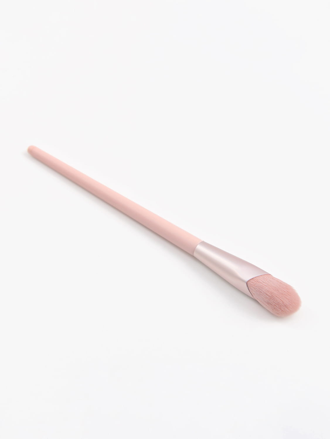 a finger belly makeup brush professional contour tool featuring a blush brush with a soft pink handle, matching pink bristles, and a sleek silver ferrule