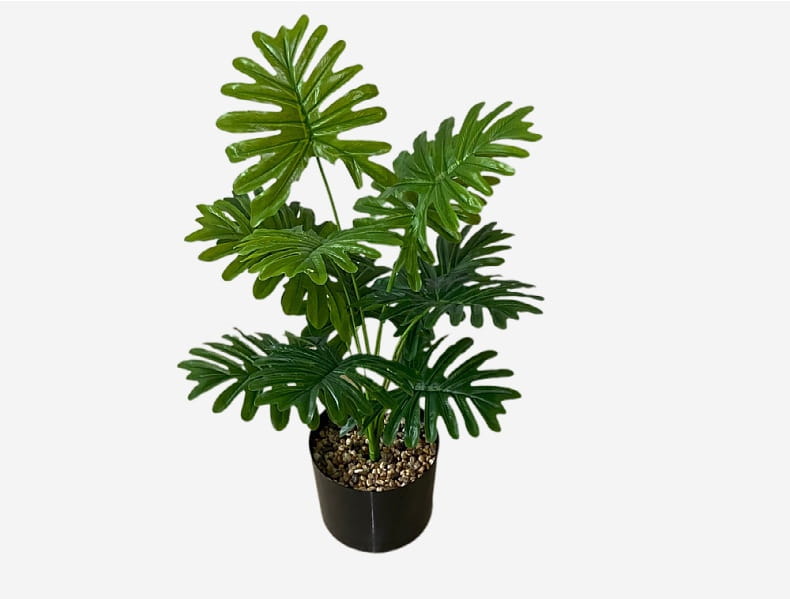 Artificial monstera turtle leaf potted plant featuring a lush green philodendron with glossy deeply lobed leaves in a sleek black pot for garden decor.
