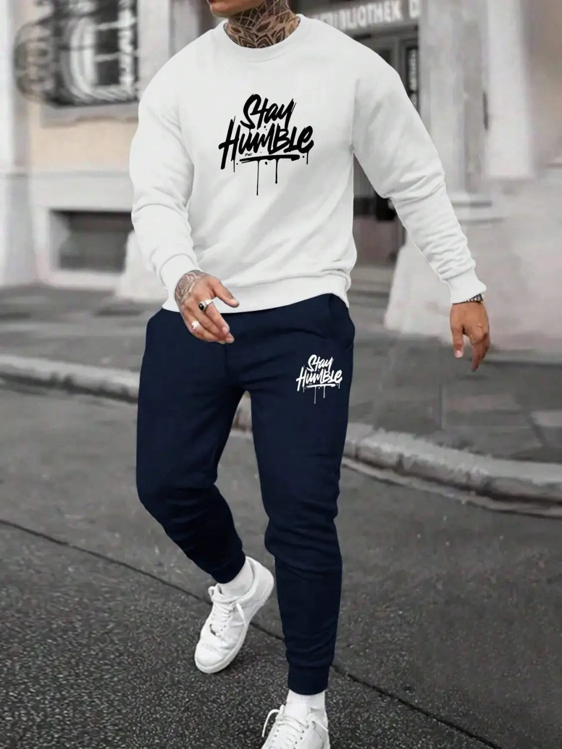 white long-sleeved fleece sweatshirt with black stay humble graphic and drip effect design from the paris printed fleece hoodie and joggers set