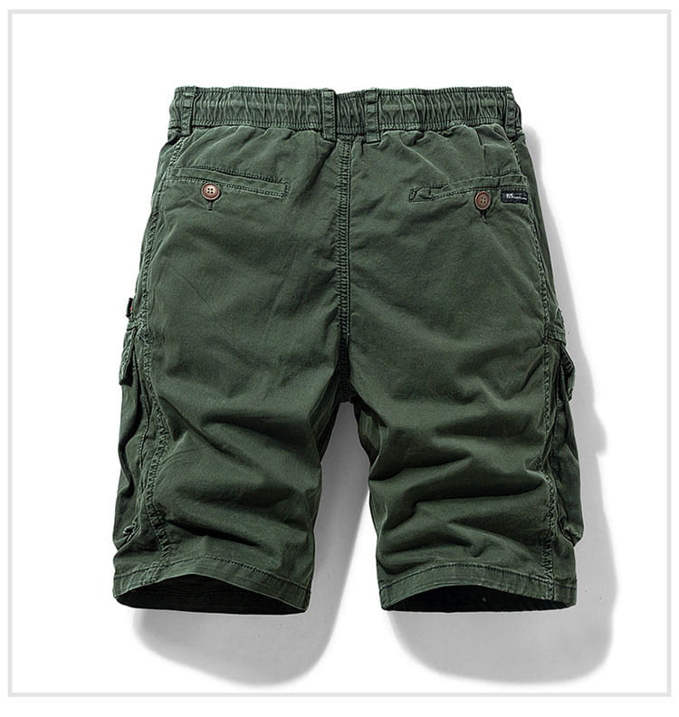 Men’s olive green cotton cargo shorts with a relaxed fit elastic waistband and buttoned back pockets shown from the back side.