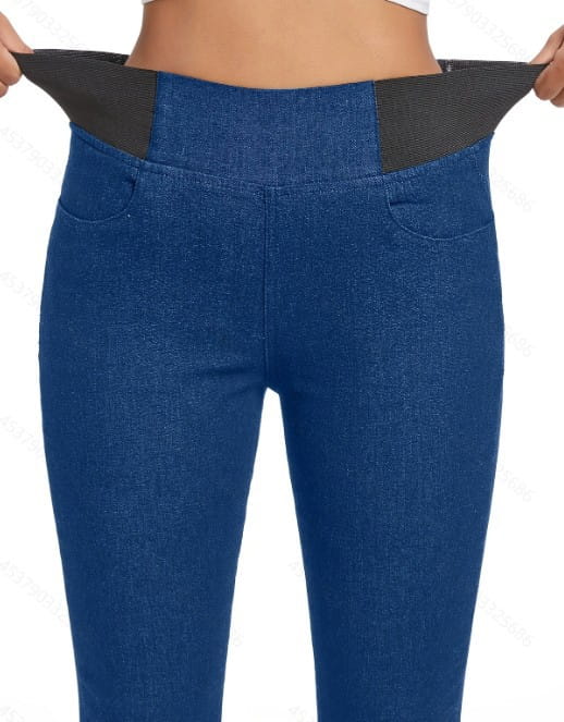 Blue denim fleece lined slim fit leggings with high waist black elastic waistband and front pockets.