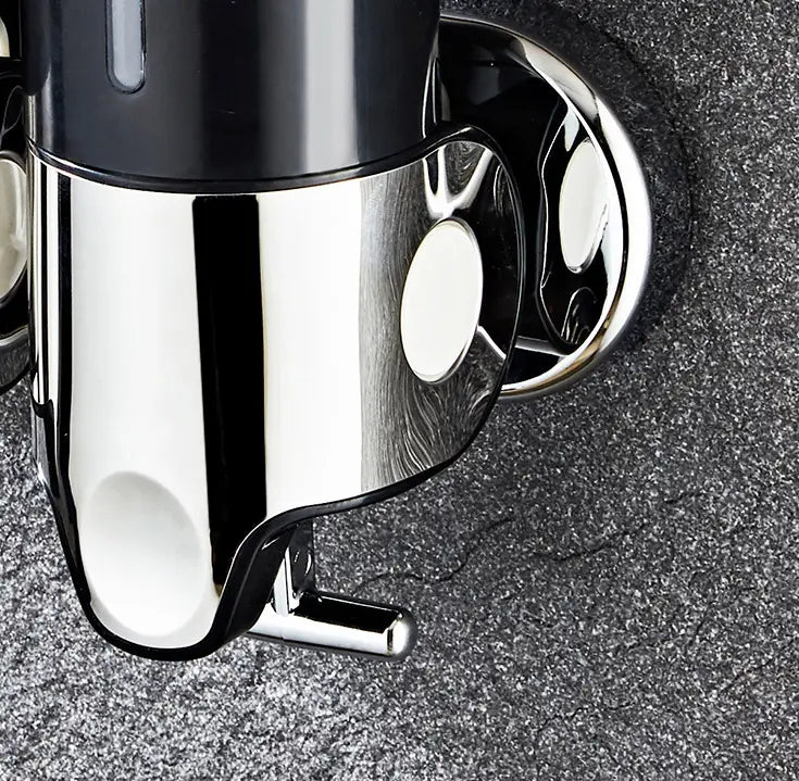 Shiny chrome-finished wall mounted soap dispenser with a black top and sleek modern design made of abs plastic.
