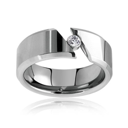 A sleek silver-toned tungsten wedding ring with a bold geometric design and a single round-cut diamond at the center featuring green aluminum accents.