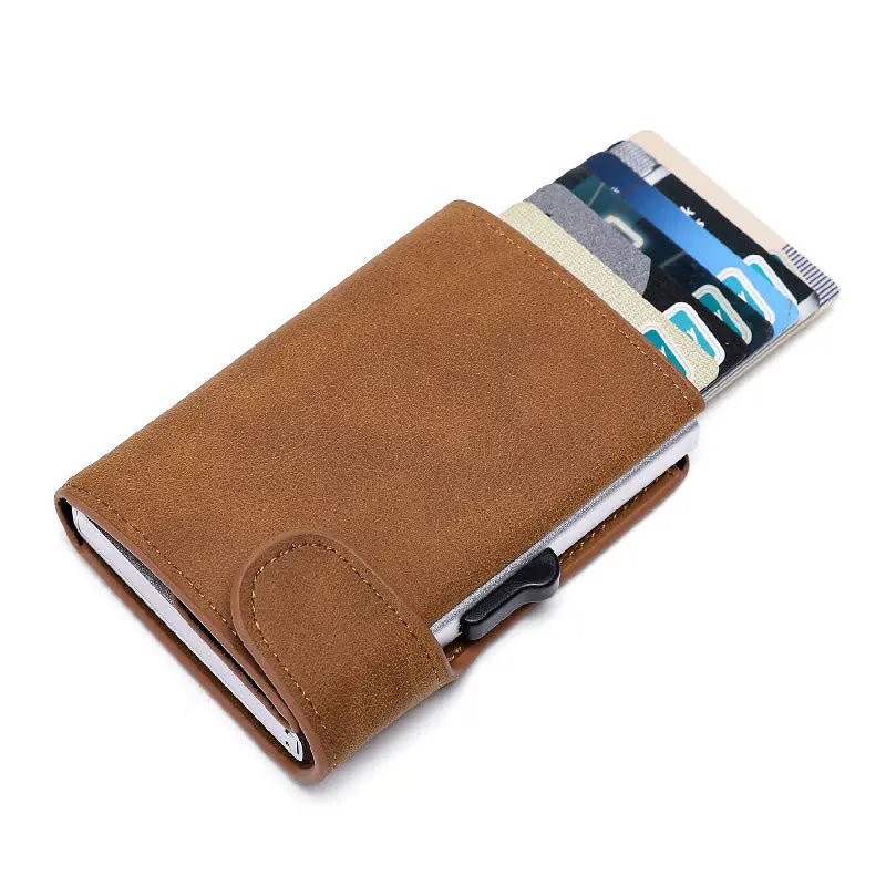 Brown suede-finish Crazy Horse leather metal card case wallet with a black clasp partially open to reveal multiple credit cards inside.