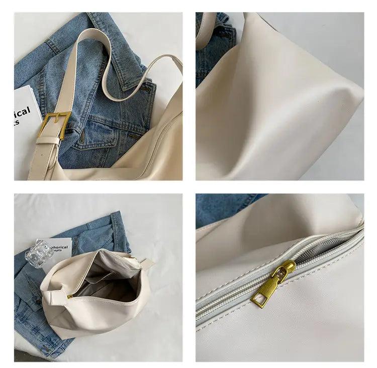 Cream-colored leather shoulder bag made of faux leather with gold-tone zipper and buckle detail on the strap.