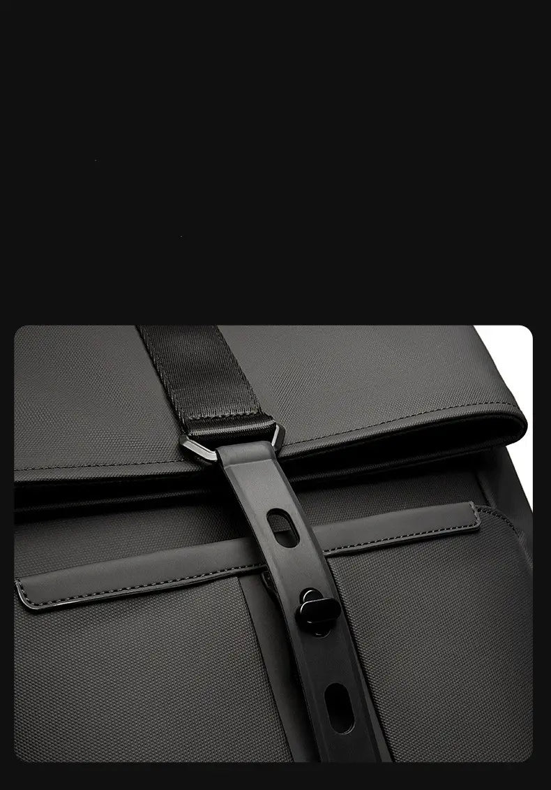 Black nylon business backpack with large 30l capacity featuring black textured fabric and sturdy black strap hardware in a sleek minimalist design.