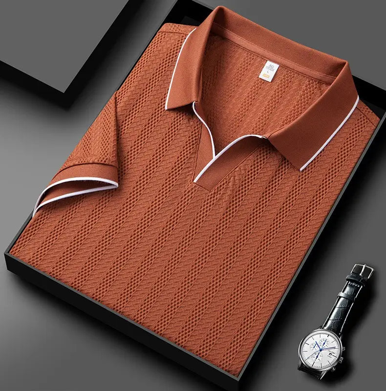 Men’s rust-colored textured ice silk polo shirt with white contrast trim on collar and sleeve cuffs.