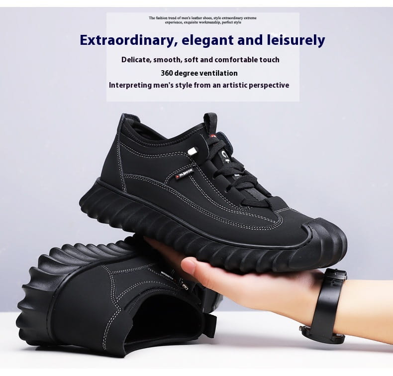 Men’s black leather casual sneakers with chunky textured rubber sole and white stitching details.
