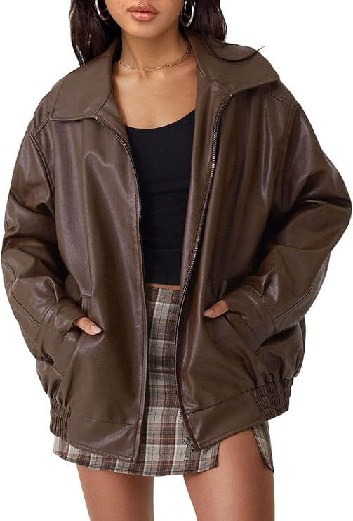 Brown faux leather bomber jacket with an oversized relaxed fit and elastic cuffs.