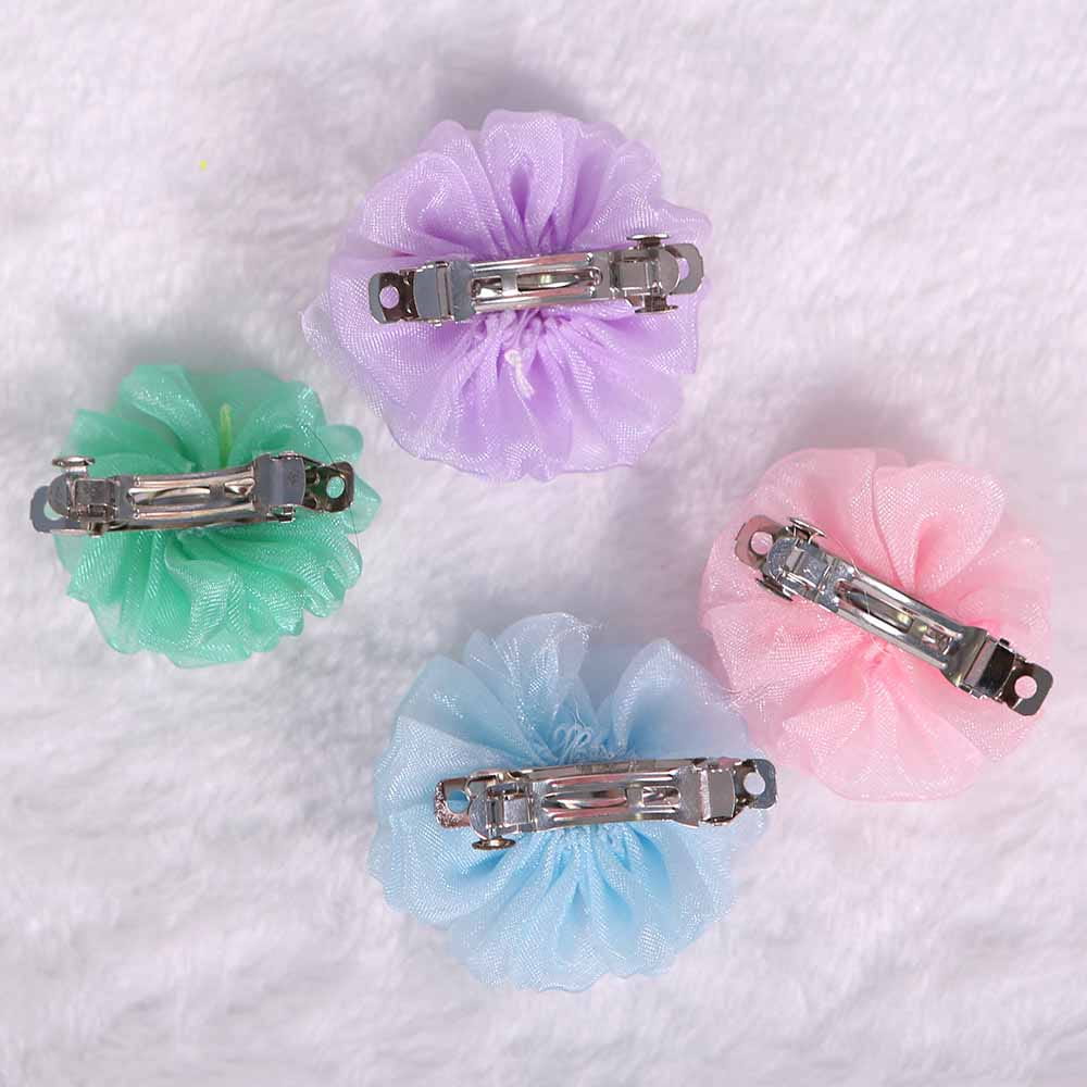 Pastel-colored floral dog hair bow made of sheer organza fabric with silver metal clasps designed as a bubble hairpin pet accessory.