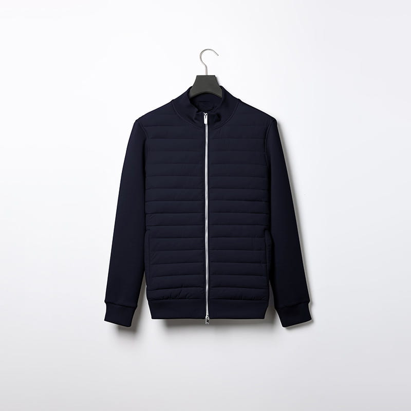 Navy blue quilted lightweight bomber jacket for men featuring a stand collar and subtle silver zipper detailing in a sleek modern design.