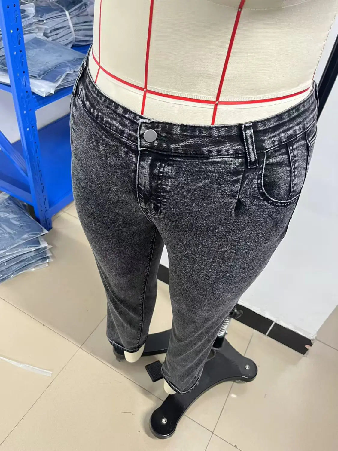 plus size retro washed tapered dark gray denim jeans with slim fit and faded wash displayed on a mannequin