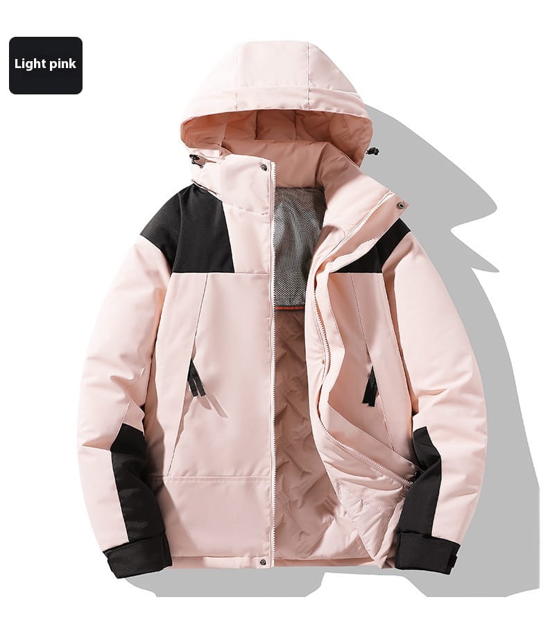 Waterproof thermal winter puffer jacket in light pink and black quilted fabric with a hood and contrasting panels on shoulders sleeves and cuffs.