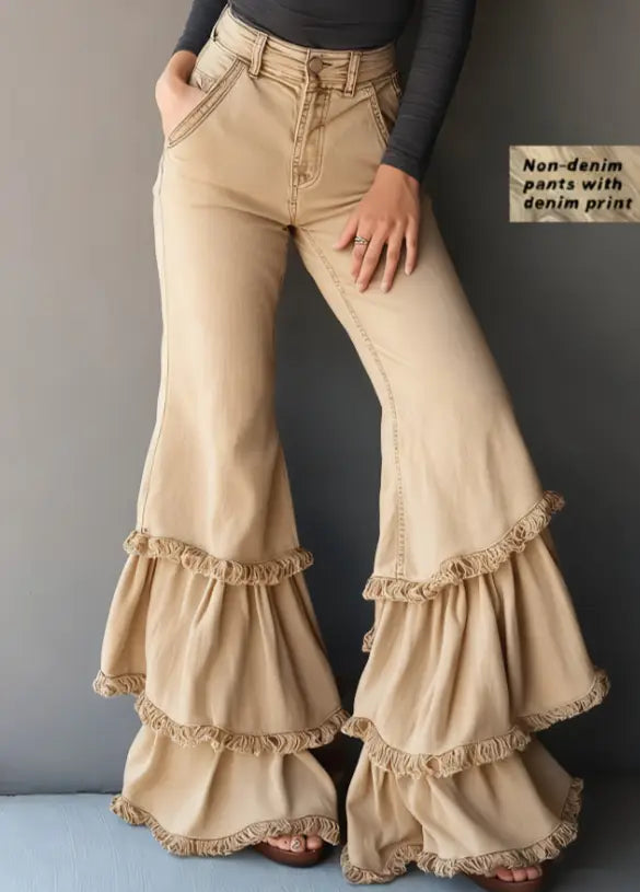Beige denim print flared pants featuring layered ruffled hems for a stylish and unique look.