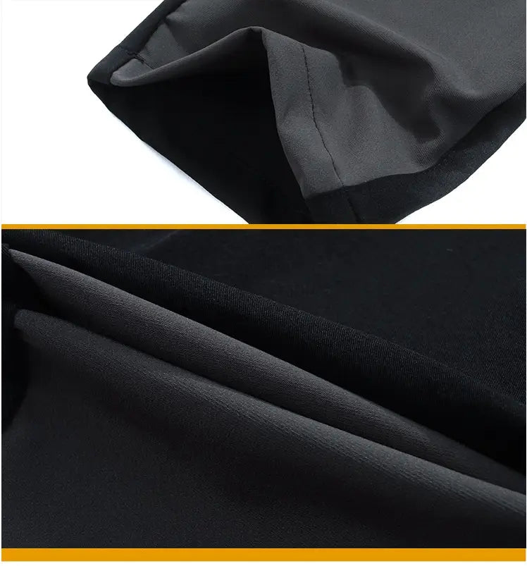 black fabric with a smooth slightly glossy finish and subtle stitching details for men’s waterproof tactical hiking pants