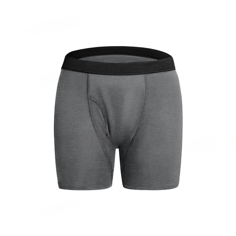 Boxers moulants athlétiques gris à absorbance avec une taille élastique noire, conçus comme des protections contre l’incontinence