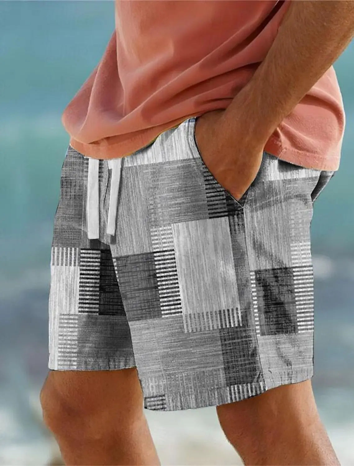 Men’s patchwork houndstooth streetwear casual shorts in gray and white with geometric patterns and a textured woven fabric.