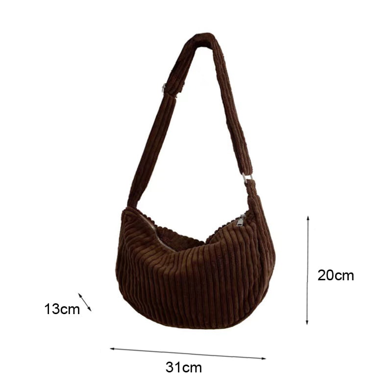 Brown corduroy crossbody shoulder bag with ribbed texture and adjustable strap for versatile wear