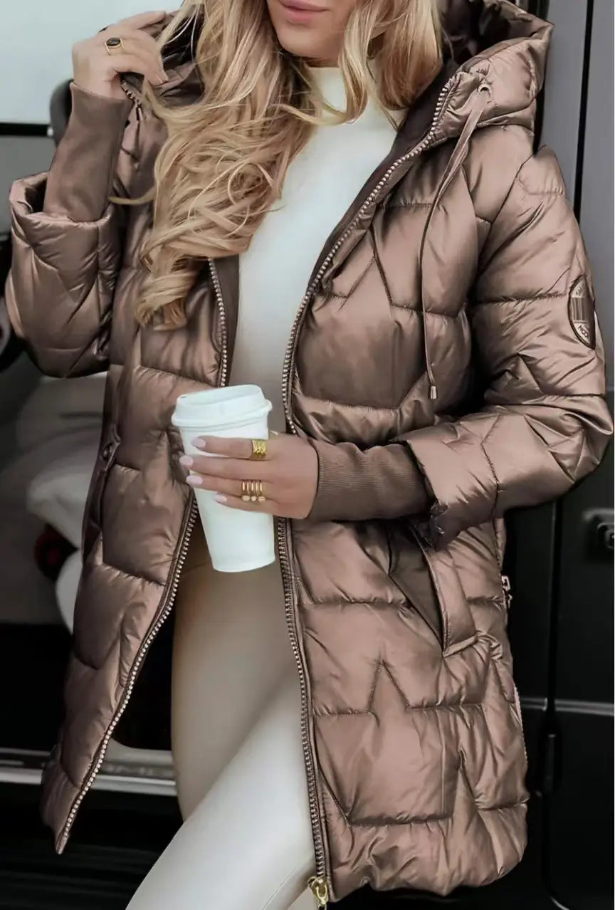 A shiny metallic bronze glossy hooded down puffer jacket with a quilted design and zipper details.