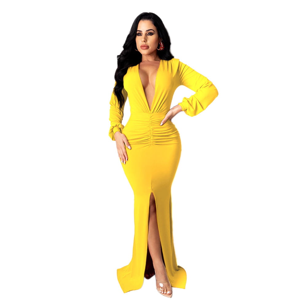 A vibrant yellow velvet v-neck evening dress with a form-fitting long sleeve design, deep v-neckline, and high slit.