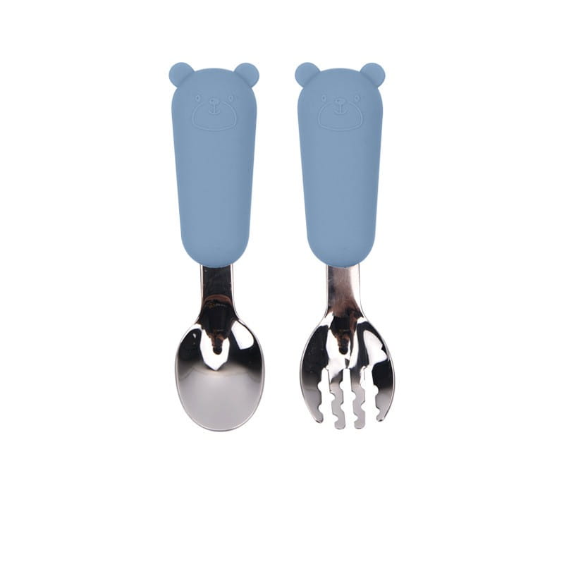 Manches en silicone en forme d’ours bleus avec cuillère et fourchette en acier inoxydable, dans un ensemble de cuillère et fourchette pour bébé en acier inoxydable.