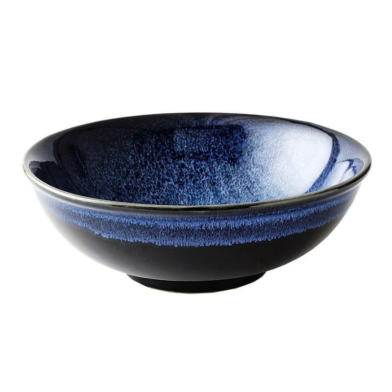 A sleek 8.5 inch ceramic ramen bowl with a gradient glaze transitioning from deep navy to soft blue featuring subtle speckles and a glossy finish in cat eye blue.