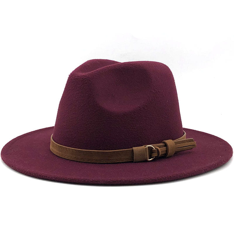 A burgundy wool fedora hat with a brown leather belt and buckle around the crown.