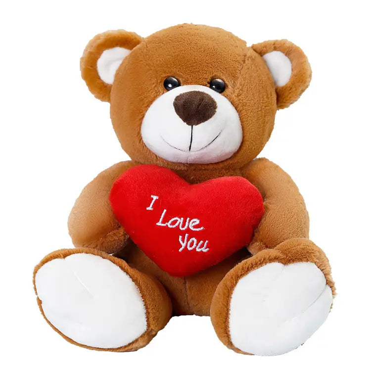 Ein kuscheliger brauner Teddybär als Plüschtier mit weißen Akzenten an Ohren, Nase und Pfoten, der ein rotes Herz hält, auf dem „I LOVE YOU“ steht, mit einer Satin-Schleife, die 25 cm misst.