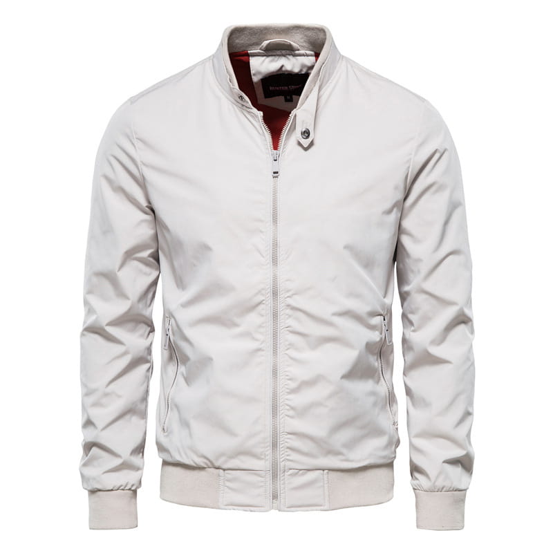 A sleek off-white men’s bomber jacket casual zip outerwear with a subtle sheen, contrasting red inner lining, and silver-toned zipper details.