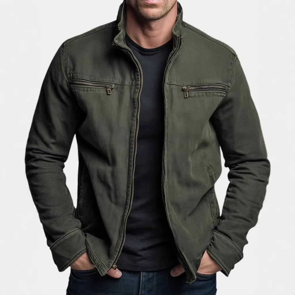 Men’s olive green faux leather workwear jacket in canvas with two front zippered pockets and a stand-up collar.