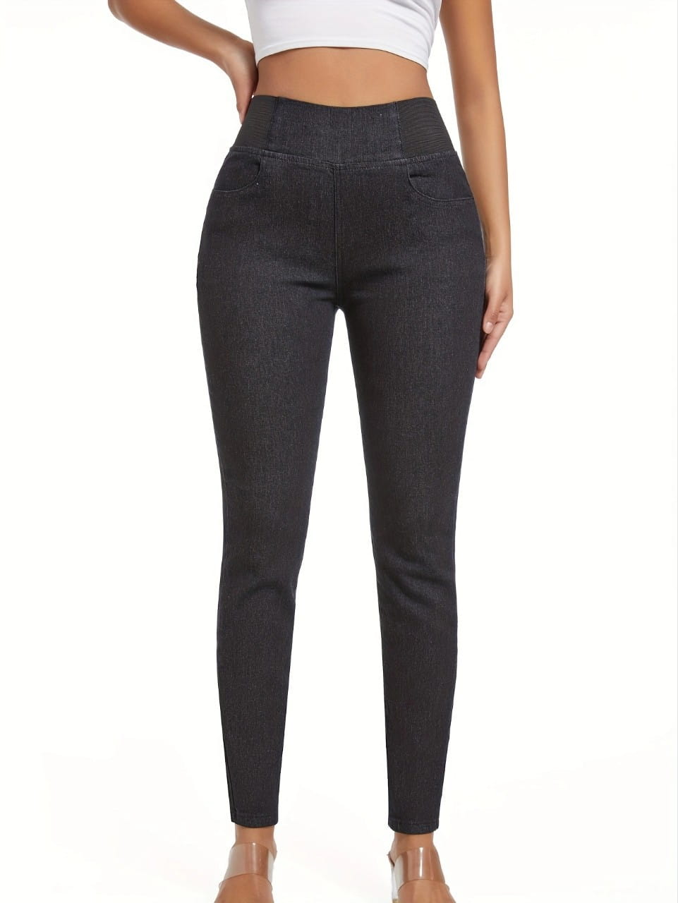 High-waisted black fleece lined slim fit denim leggings with a snug, form-fitting silhouette.