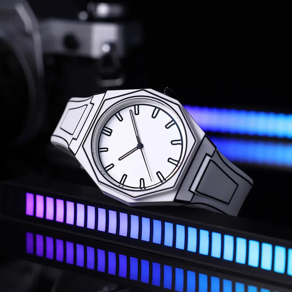 A sleek minimalist white modern octagonal silicone watch with matching strap designed to be waterproof.