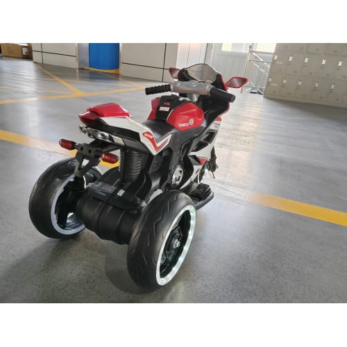6v kids electric ride on motorcycle in red and white features a three-wheeled design with black tires and chrome accents for children.