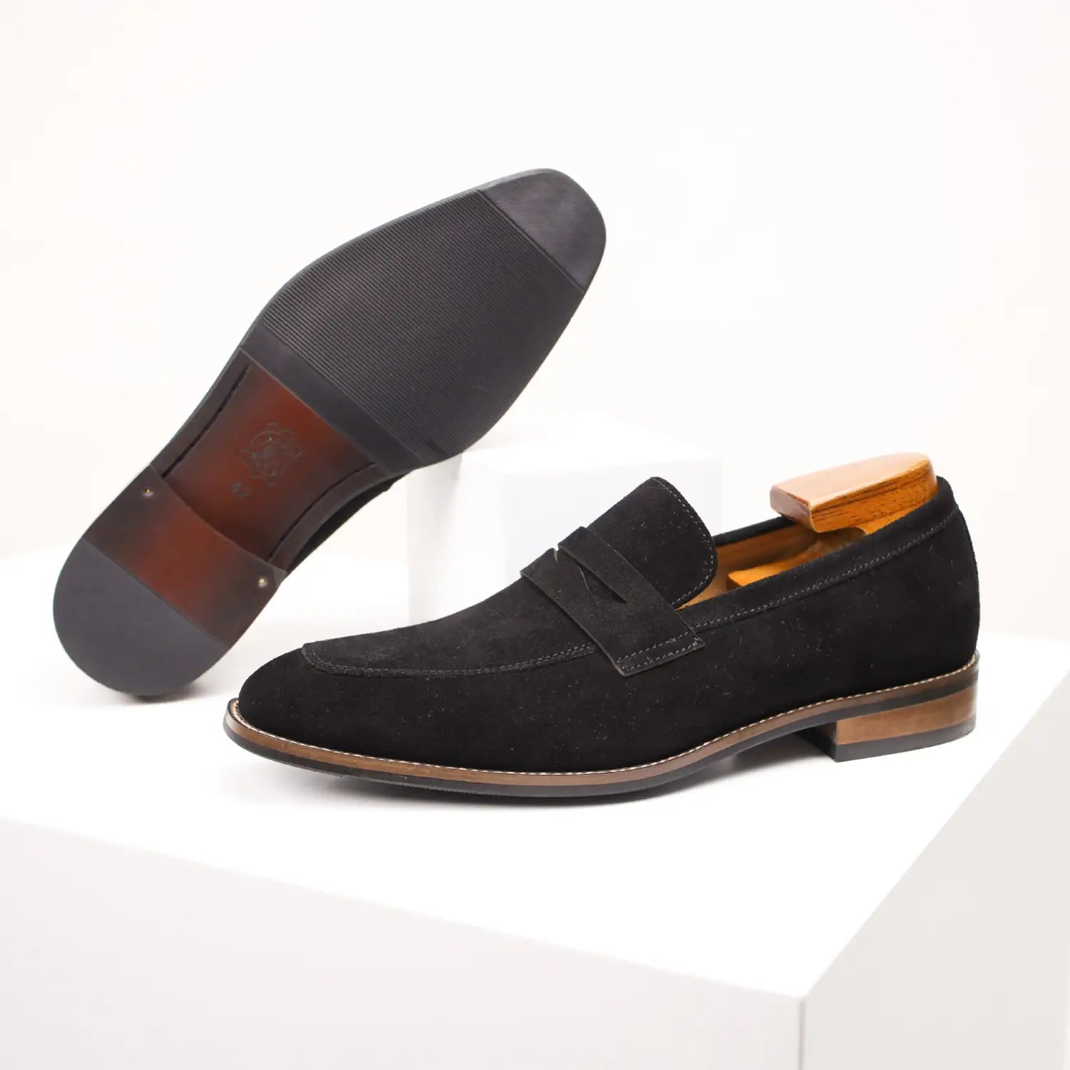 Men’s brown suede penny loafer casual leather shoe with black suede upper brown leather sole and wooden insole.