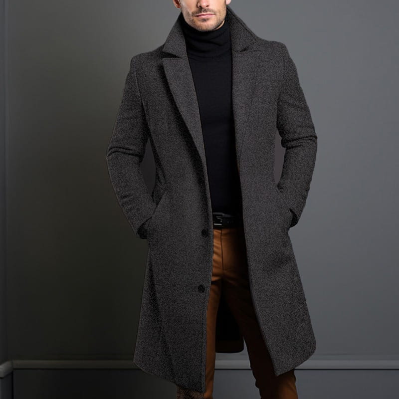 Men’s dark gray woolen trench coat featuring a textured wool overcoat with a notched collar and front button closure suitable for business use.